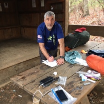 Tim signing log book